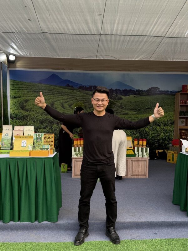 TRAVINA founder at a Thai Nguyen tea festival stand