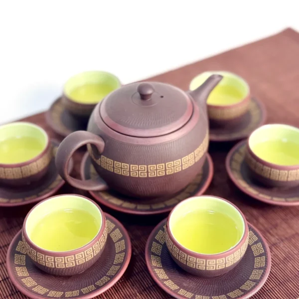 Luc Am Quan Anh zisha tea set with five cups of green tea on a bamboo tray – TRAVINA