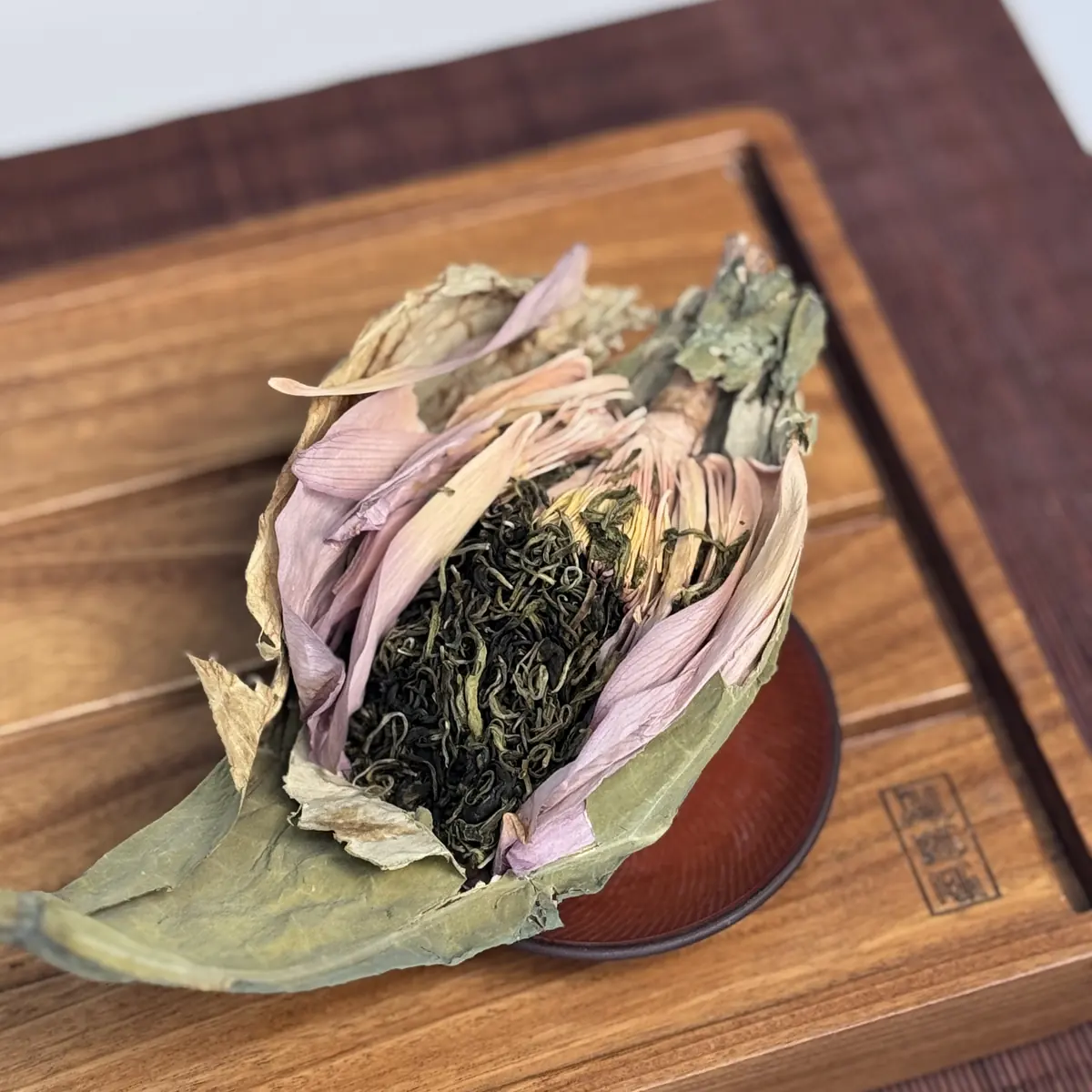West Lake Lotus Tea – lotus opened to show the tea